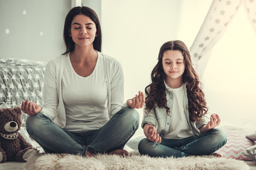 Wall Mural - Mom and daughter