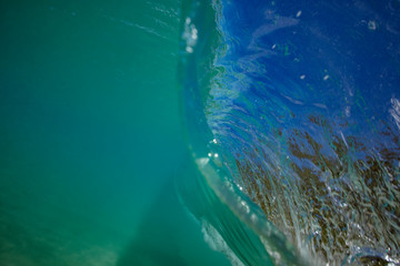 Wall Mural - ocean wave closing in barrel. view from inside with underwater part and a lip surface