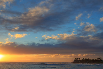 Wall Mural - beautiful ocean sunset with big waves in hawaii