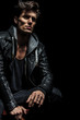 © Viorel Sima - seated man in leather jacket dreaming away