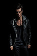 © Viorel Sima - dramatic portrait of a young man in leather jacket