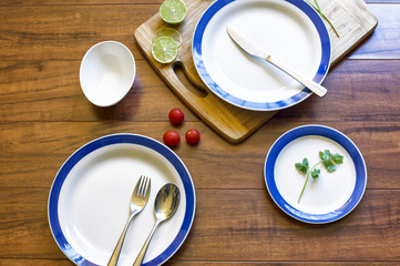 Empty plate on wood table background