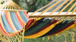 Close-up color travel hammock for relaxing in the trees. Stay in the journey on the hammock