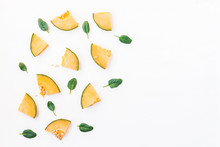 Sliced Melon On White Background. Flat Lay, Top View