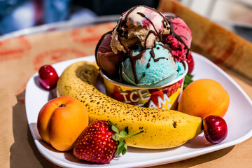 ice cream in cup with fruits