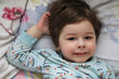 © alexkich - Portrait of a young child lying on a pillow