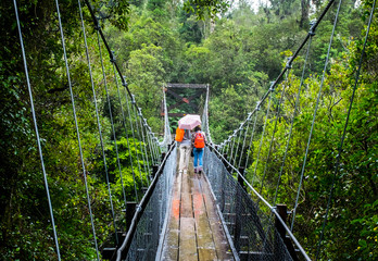 two girls on the woods bridge