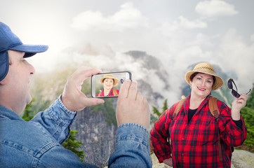 Retired couple backpacking in mountains