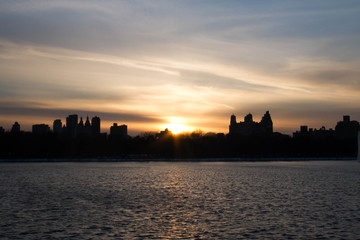 Wall Mural - Sunset reflects on the lake in New York