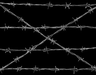 x - crossed barbed wire isolated against the black backgound