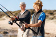 © Sergey Nivens - Senior man fishing with his grandson