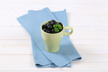 Wall Mural - black olives with parsley