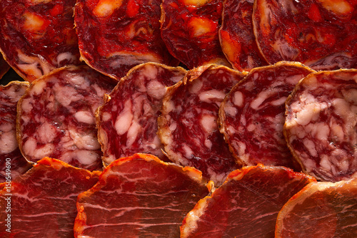 Cuadros en Lienzo Iberian sausages ham board Tapas from spain