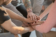 © Photographee.eu - Group holding hands together