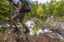 A Man Hikes The International Appalachian Trail East Of Baxter State Park In Maine's Northern Forest. Near Grand Pitch On The East Branch Of The Penobscot River. (MR)