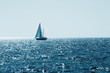 Small sailboats on the horizont.