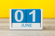 June 1st. Image of june 1 wooden color calendar on yellow background. First summer day. Happy Childrens Day