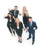 © ASDF - Group of business people standing together in office and showing