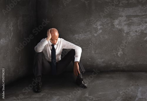 Fotografía Alone desperate businessman. solitude and failure concept