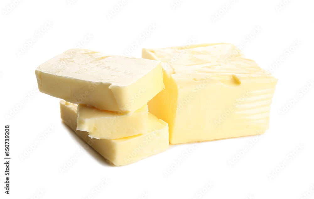 Delicious butter pieces on white background, closeup