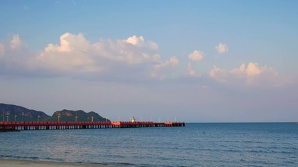 Wall Mural - Sea and cloud with bridge and lighthouse in the afternoon