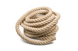 Pile of thick sturdy hemp rope on white background