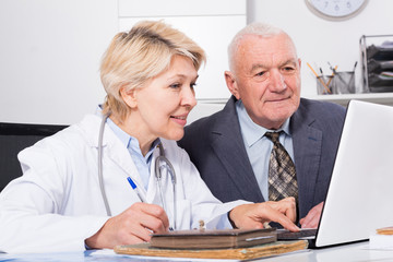 Female doctor with male client