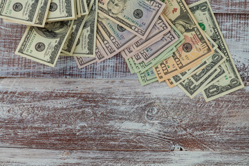 Wall Mural - money isolated on a wooden background