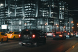 Fototapeta  - Cars in motion on the road in night city