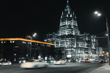 Wall Mural - Cars in motion on the road in night city