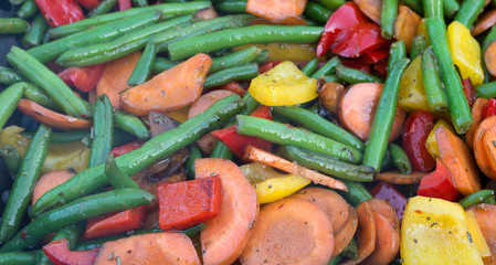 Wall Mural - Grilled vegetables - green beans, red and yellow bell peppers and carrot. Selective focus..