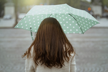 Woman with umbrella in Paris