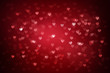 Heart bokeh on red background