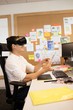 © WavebreakMediaMicro - Businessman wearing vr glasses in office