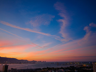 Wall Mural - dark blue, orange and yellow colors sunset sky over penang island