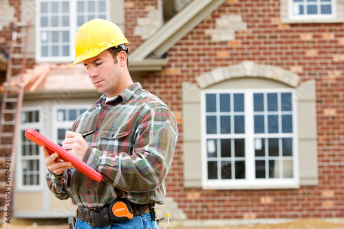 Fotomural Construction: Home Inspector Checking House