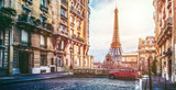 Fototapeta Sypialnia - The eifel tower in Paris from a tiny street