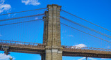 Fototapeta Most - Brooklyn Bridge New York - a famous landmark- MANHATTAN / NEW YORK - APRIL 1, 2017