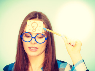 Wall Mural - woman thinking light idea bulb on head