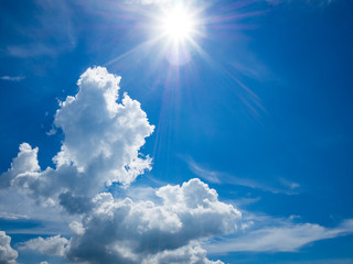 Wall Mural - sun light with blue sky and white clous with grain