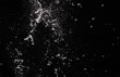 © vardy - Water splash on black background