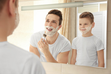 Wall Mural - Father and son shaving in bathroom