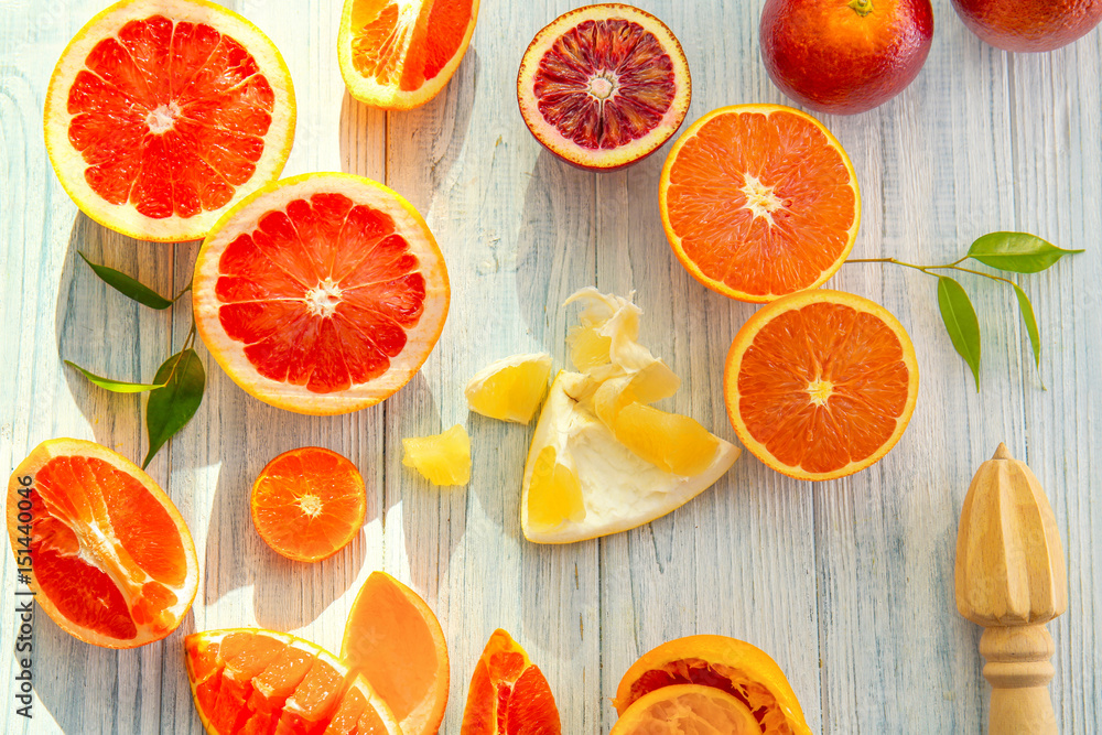 Beautiful composition with citrus fruits on wooden background