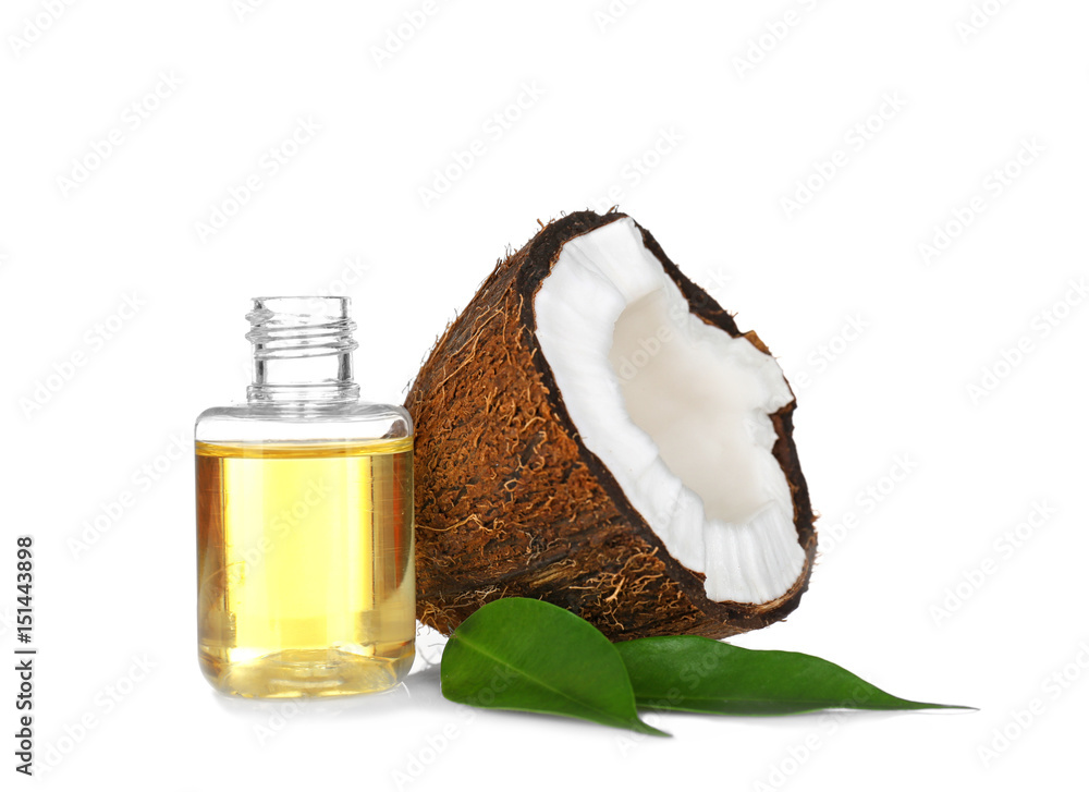 Perfume bottle and coconut on white background
