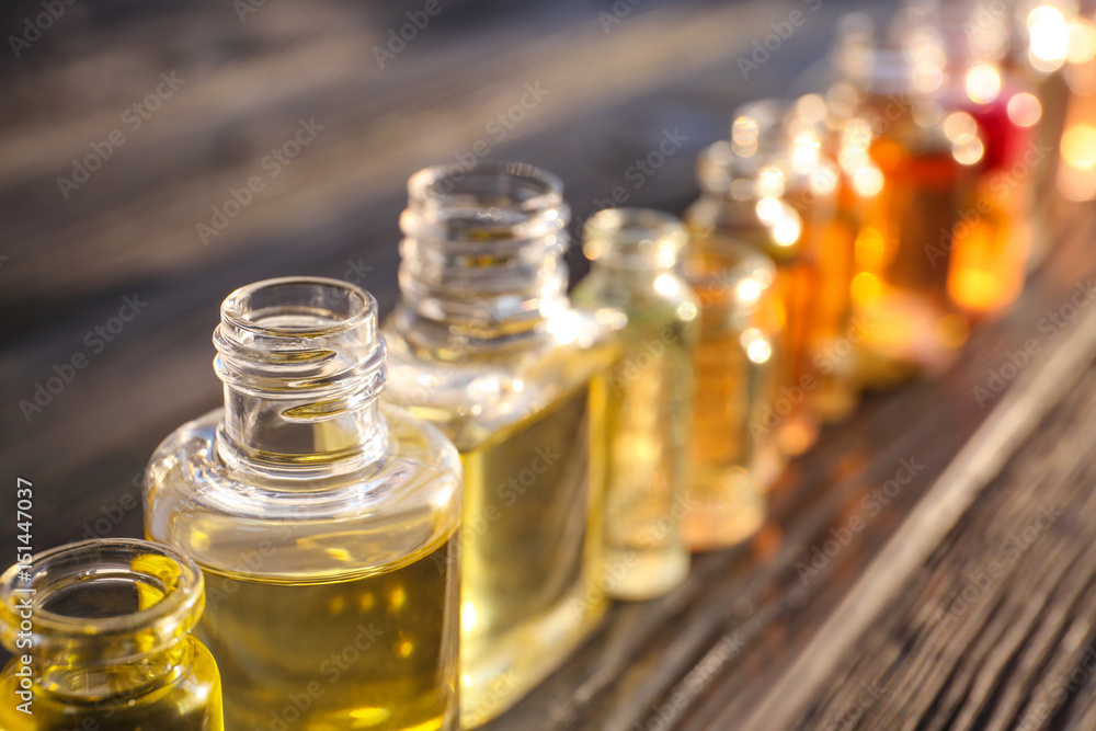 Perfume bottles on wooden table