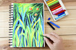 © nicemyphoto - Oil pastels  crayons colorful picking art drawing on wood table.