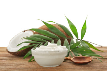 Poster - Bowl with fresh coconut oil on wooden table