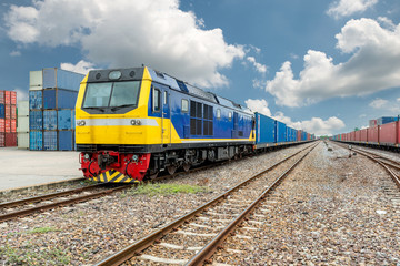 Cargo train platform with freight train container at depot in port use for export logistics background.