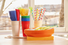 Colorful Plastic Ware For Picnic On Table