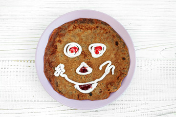 Chocolate pancake for kid. Breakfast. The concept of food and vegetarian.